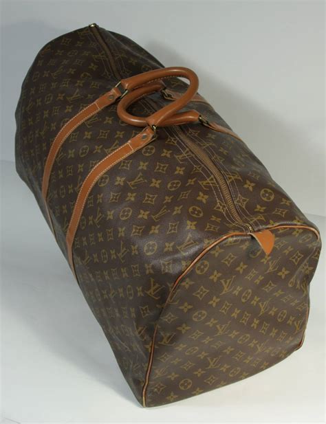 used lv duffle bag|louis vuitton duffle bag suitcase.